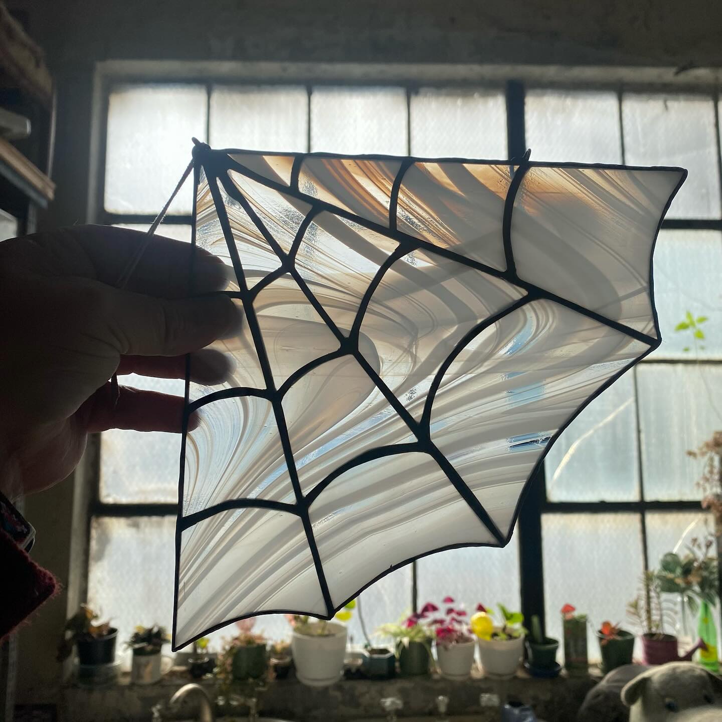 Stained glass corner spider web